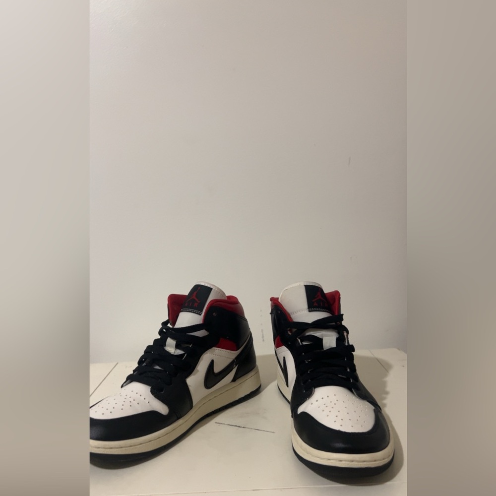 Nike Air Jordan Black, White, and Red High-Tops